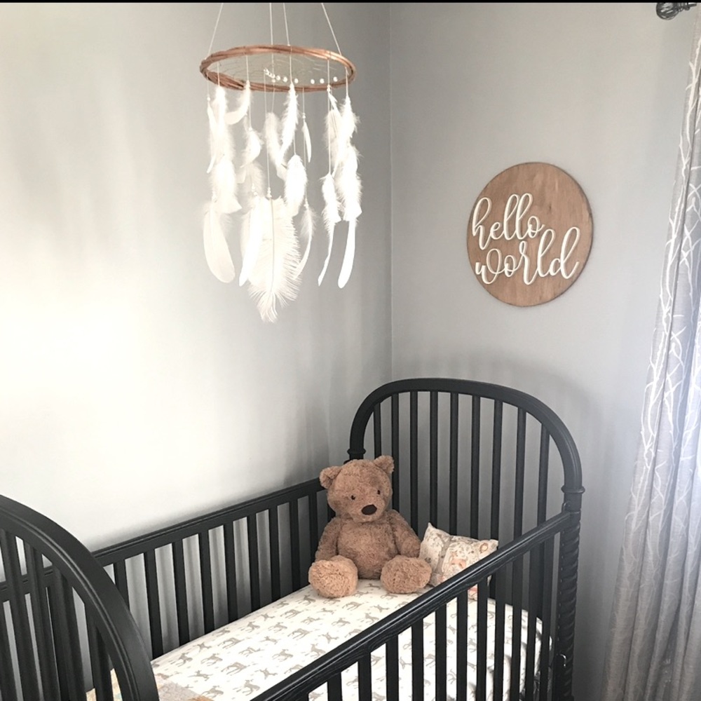 Feathered dreamcatcher mobile for nursery
